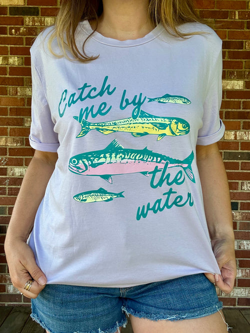 Catch Me By the Water graphic tee in lavender with colorful fish print