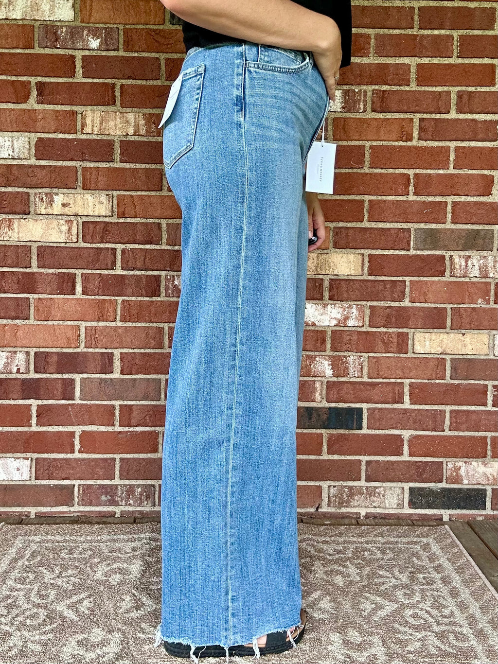 SUPER HIGH RISE MEDIUM WASH RAW HEM WIDE LEG JEANS