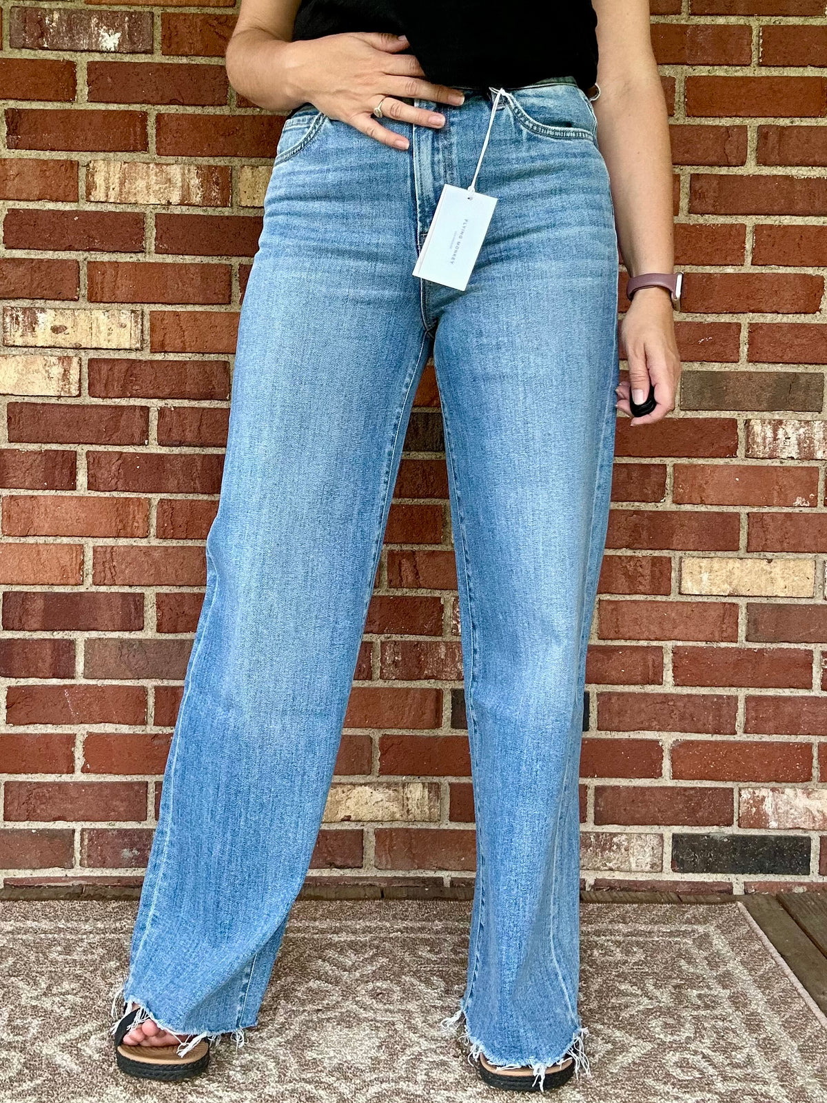 SUPER HIGH RISE MEDIUM WASH RAW HEM WIDE LEG JEANS