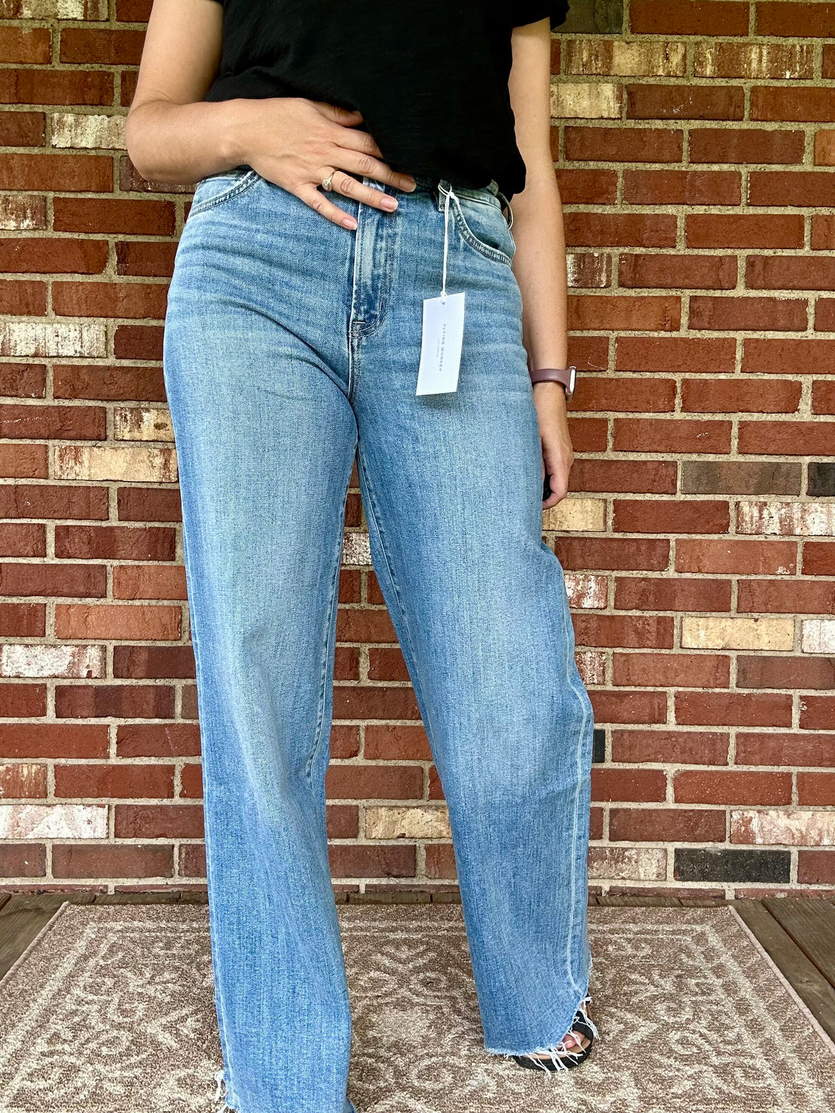 SUPER HIGH RISE MEDIUM WASH RAW HEM WIDE LEG JEANS